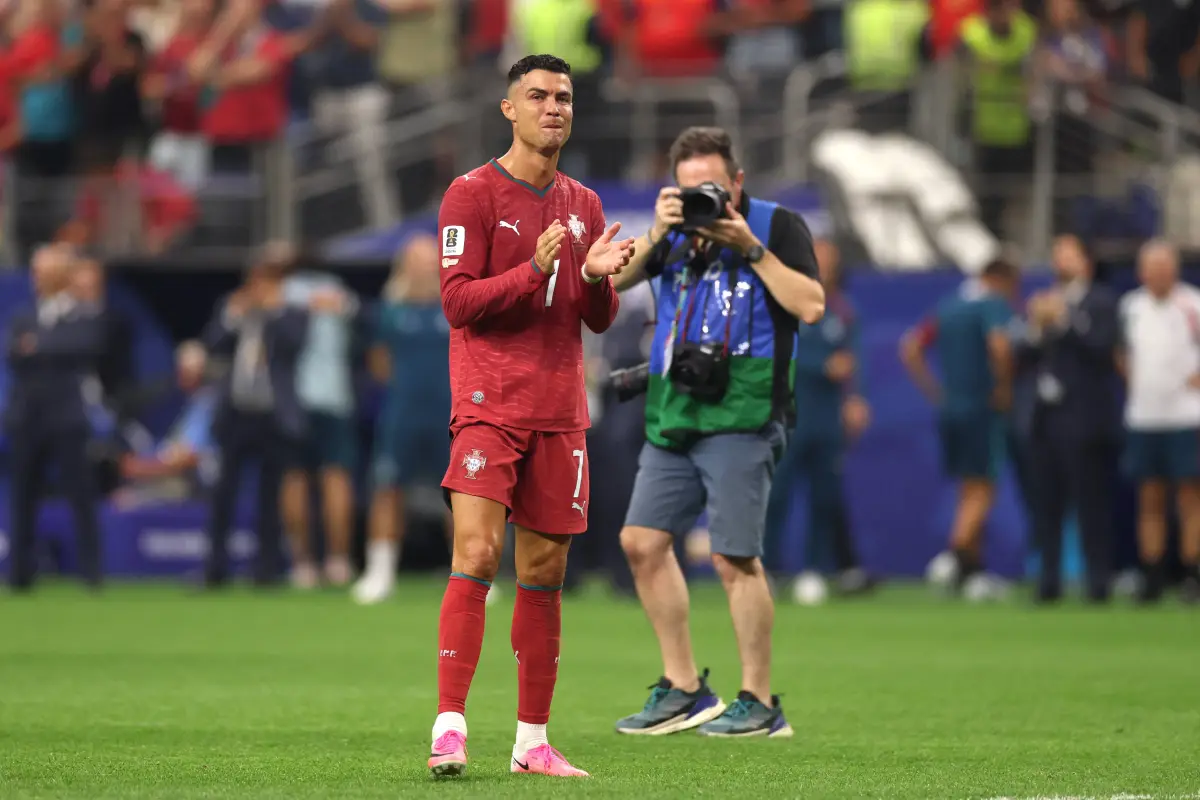 Cristiano llorando en medio de la cancha de Dallas tras despedirse de los Mundiales sin ganar uno., LARS BARON / GETTY IMAGES NORTH AMERICA / GETTY IMAGES VIA AFP