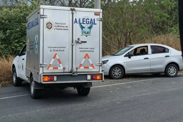 Las víctimas fueron sopreprendidas a tiros cuando iban en un carro. ,Cortesía